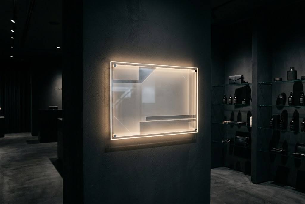 Backlit acrylic signboard in an interior