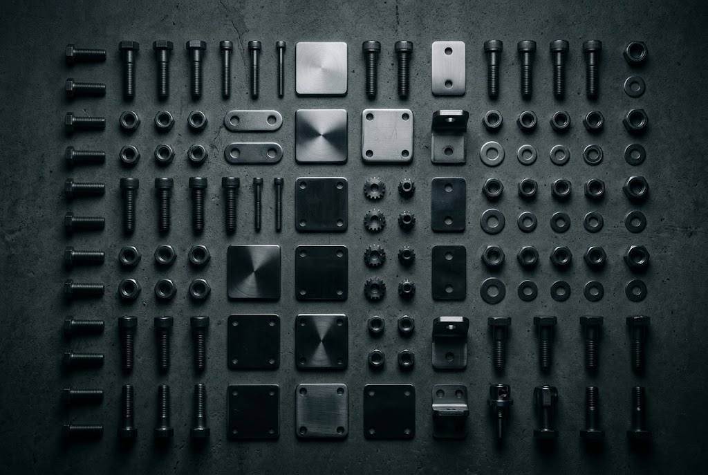 Assorted industrial steel hardware components